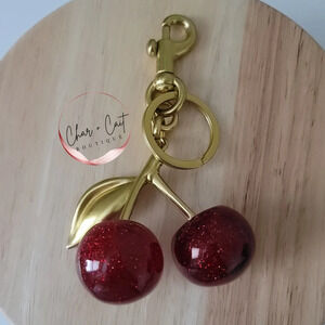 Gold-tone Cherry Keychain Bag Charm with Red Resin Accents